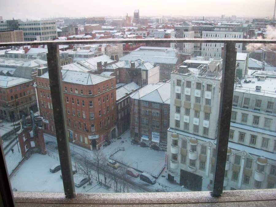 View of Manchester City Centre covered in snow taken from a hotel balcony by LGBT fantasy book writer Catherine Green of SpookyMrsGreen.com mindful parenting and modern pagan lifestyle blog.