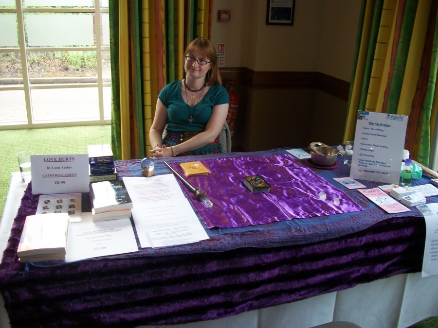 Photo of professional Tarot reader and LGBT fantasy book writer Catherine Green of SpookyMrsGreen.com pagan lifestyle blog at a Mind, Body, Spirit event in UK.
