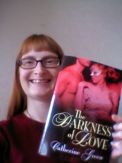 Vampire writer Catherine Green with her LGBT fantasy book The Darkness of Love Victorian vampire romance novel.