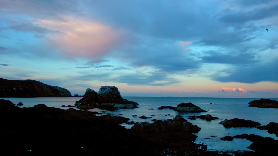 #WitchyWednesday Cloudy Sky over Rocks in the Sea copyright Catherine Green of SpookyMrsGreen.com mindful parenting and modern pagan lifestyle blog.