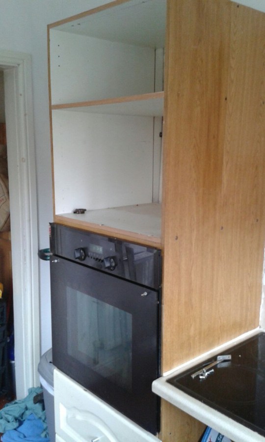 Image of old cupboards and oven in a small Victorian terraced house in UK. My Kitchen Renovation: Bye Bye Old Cooker at SpookyMrsGreen.com mindful parenting and modern pagan lifestyle blog.
