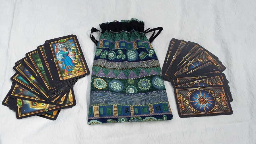 Photo of Gilded Tarot card deck and handmade Tarot bag owned by professional Tarot reader Catherine Green of SpookyMrsGreen.com pagan lifestyle blog.