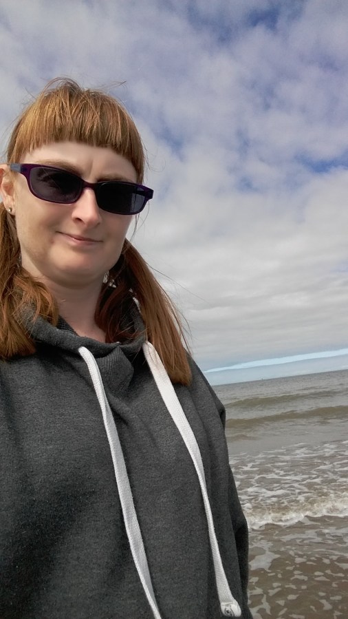 Selfie on Talacre Beach in North Wales by SpookyMrsGreen.com mindful parenting and modern pagan lifestyle blog. Copyright Catherine Green