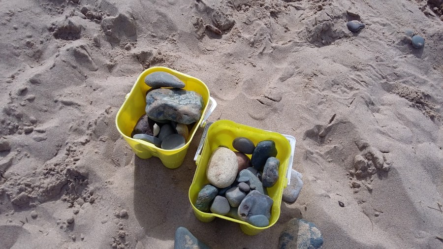 Bucket of shells and a bucket of beach pebbles found on Talacre Beach in North Wales by SpookyMrsGreen.com mindful parenting and modern pagan lifestyle blog. Copyright Catherine Green