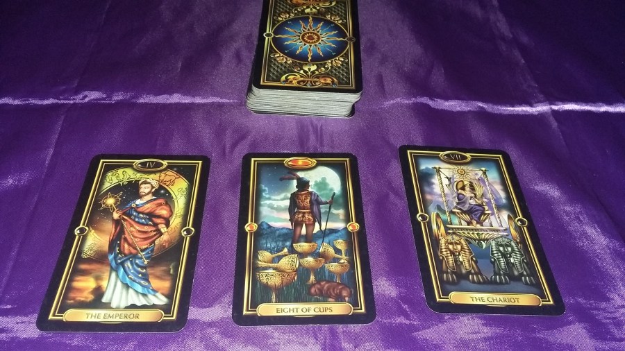 Image of Gilded Tarot cards on a purple cloth. #365DaysofTarot New Year Tarot reading with Gilded Tarot card deck owned by professional Tarot reader Catherine Green of SpookyMrsGreen.com pagan lifestyle blog.