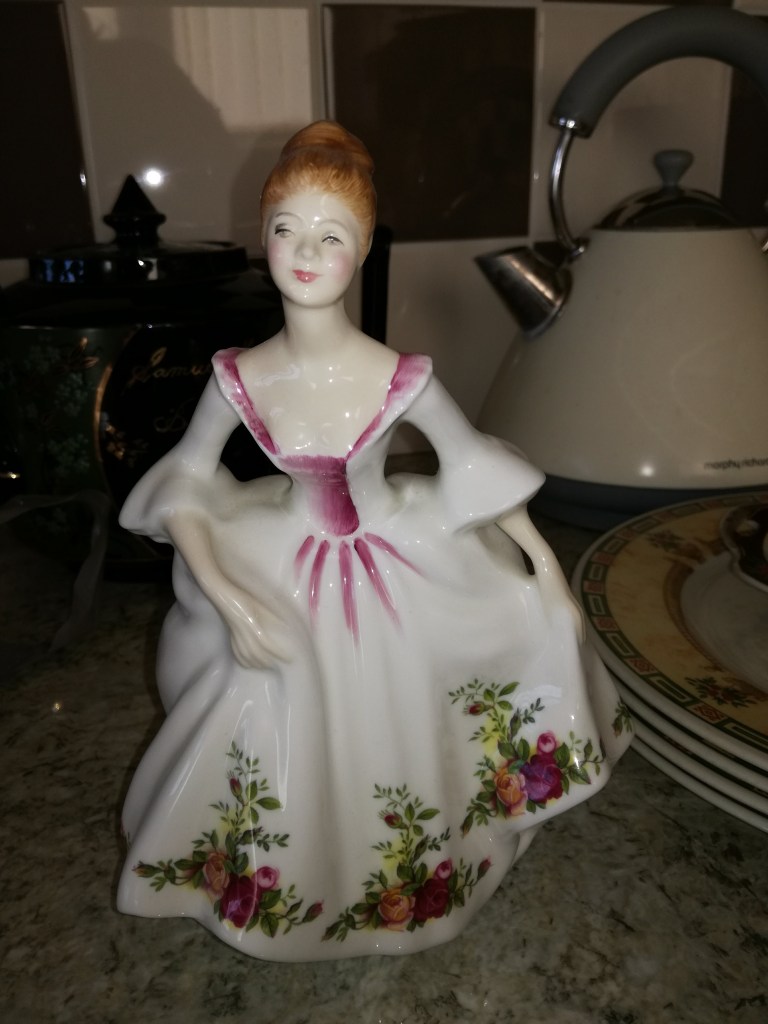 Royal Albert Old Country Roses Lady ornament from Wedgwood. Family heirloom owned by SpookyMrsGreen.com mindful parenting and modern pagan lifestyle blog.