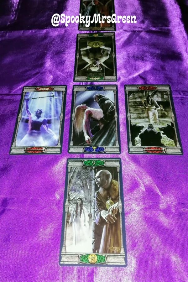 Vampires Tarot of the Eternal Night Tarot cards Tarot card reading on purple cloth SpookyMrsGreen.com pagan lifestyle blog.