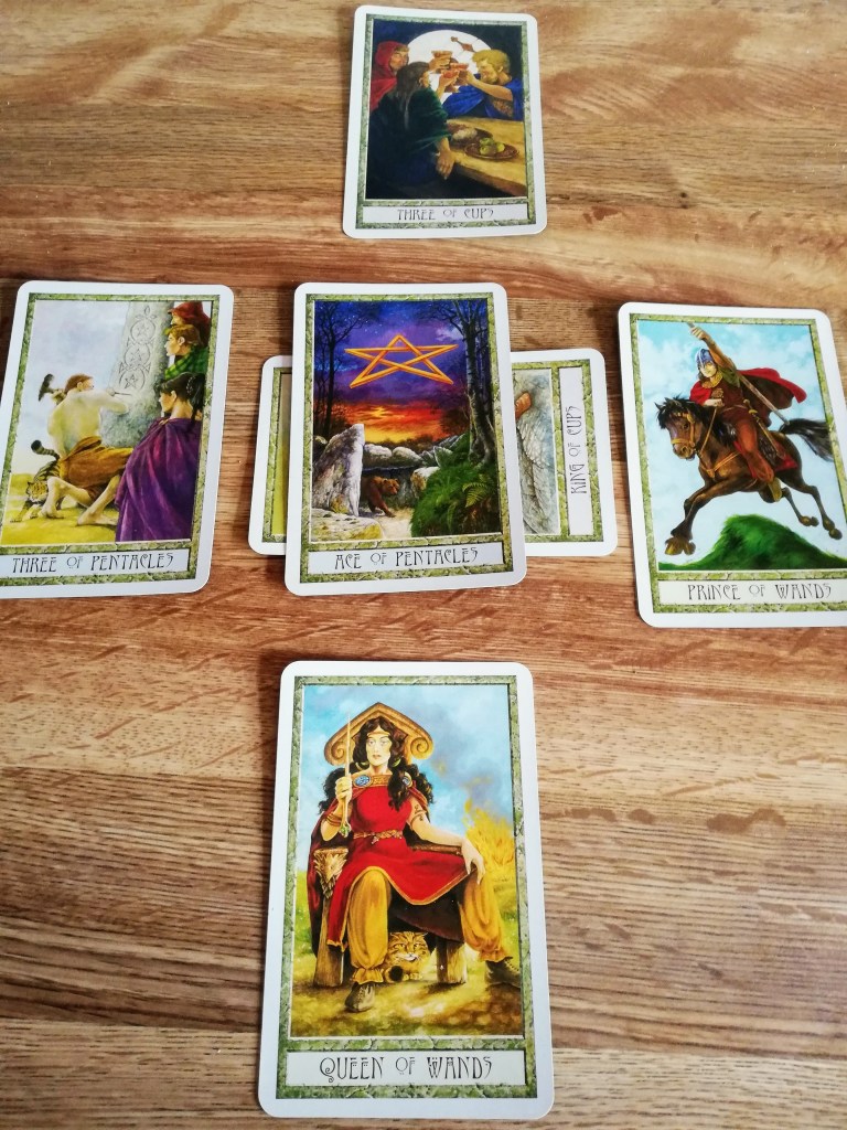 Image of Druid Craft Tarot cards laid out in a Celtic Cross Tarot spread. Imbolc Tarot Card Reading by professional Tarot reader Catherine Green of SpookyMrsGreen.com pagan lifestyle blog.