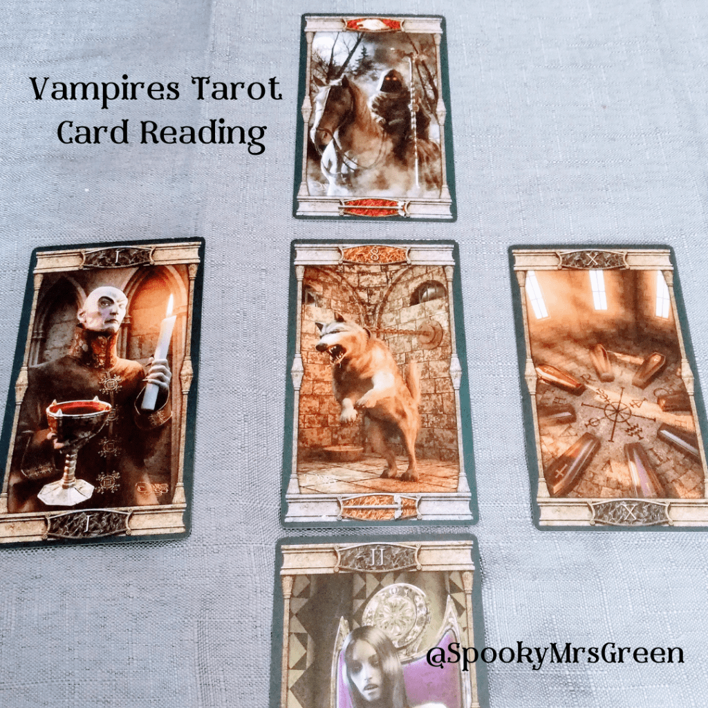 Image of Vampires Tarot of the Eternal Night Tarot cards on a grey cloth. Text reads "Vampires Tarot Card Reading @SpookyMrsGreen." Vampires Tarot Card Reading by professional Tarot reader Catherine Green of SpookyMrsGreen.com pagan lifestyle blog.