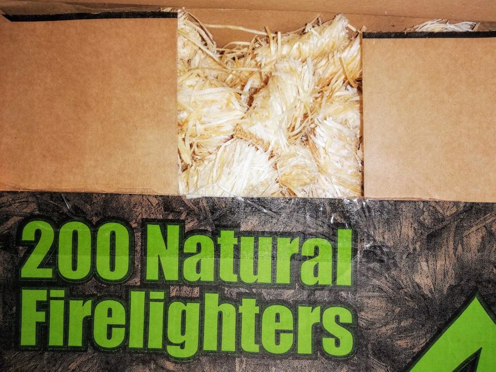 Image of a box of natural firelighters. #ProductReview White Horse Energy logs, kindling and firelighters at SpookyMrsGreen.com mindful parenting and modern pagan lifestyle blog.