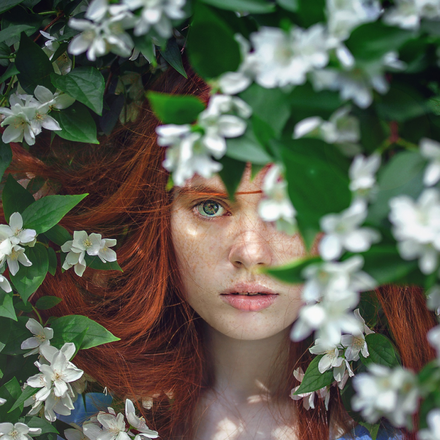 Red haired fairy hiding in the trees featured at SpookyMrsGreen.com mindful parenting and modern pagan lifestyle blog.