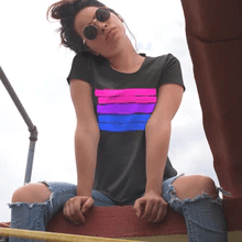 Image of a woman wearing a Pride Bisexual Flag Tee from The Spark Company affiliated with SpookyMrsGreen.com pagan lifestyle blog.