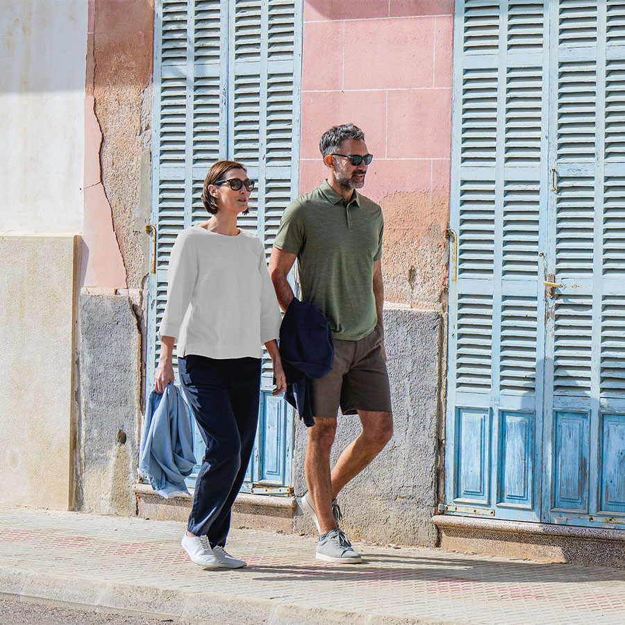 Man and woman in the sunshine exploring a city. Rohan Performance Linen. Affiliated with SpookyMrsGreen.com mindful parenting and modern pagan lifestyle blog.