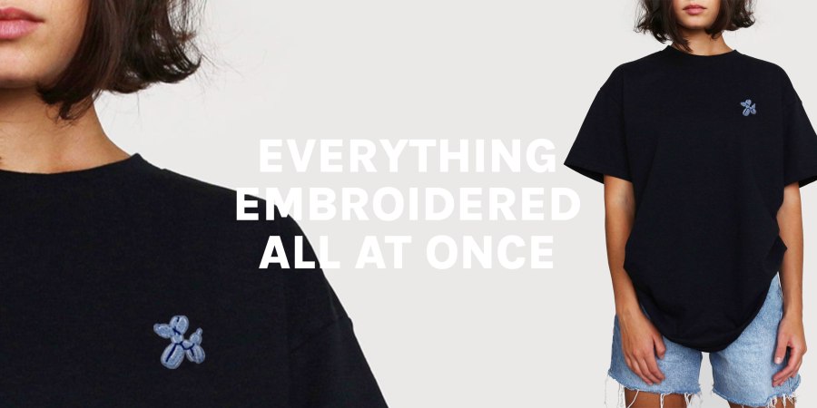 Image of a model wearing a black t-shirt with an embroidered balloon dog design and denim shorts. Text reads, “Everything Embroidered all at Once.” Existential Thread affiliated with SpookyMrsGreen.com mindful parenting and modern pagan lifestyle blog.