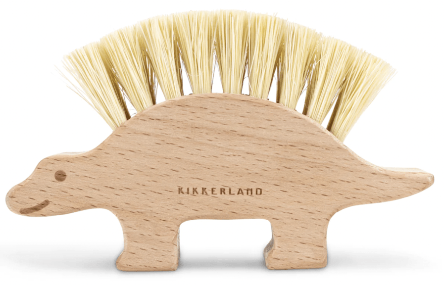 Image of Dino Nail Brush from Kikkerland affiliated with SpookyMrsGreen.com mindful parenting and modern pagan lifestyle blog.
