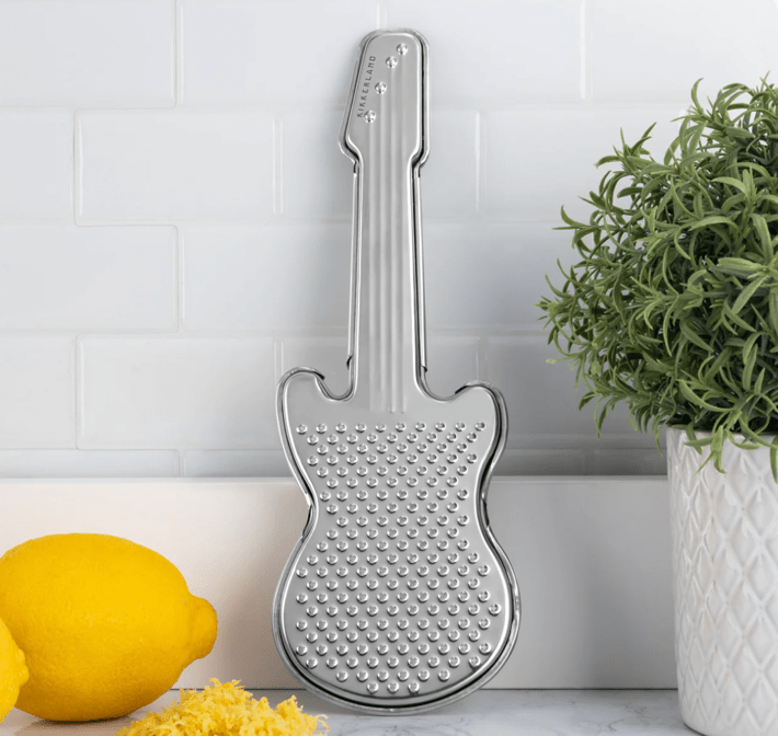 Image of Guitar Grater from Kikkerland affiliated with SpookyMrsGreen.com mindful parenting and modern pagan lifestyle blog.
