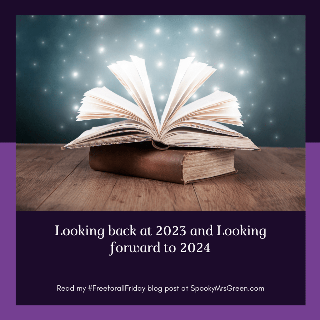 Black and purple background with an image of an open book and twinkling lights representing the magic of reading and knowledge. Text reads, “Looking back at 2023 and looking forward to 2024. Read my #FreeforallFriday blog post at SpookyMrsGreen.com.” Mindful parenting and modern pagan lifestyle blog.