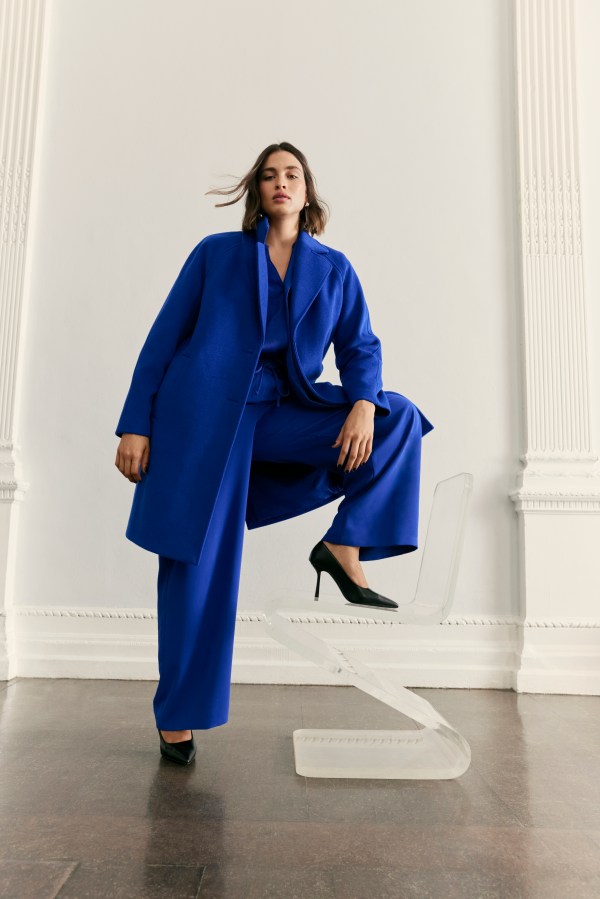 Image of a woman looking stylish in a blue suit. M&S online Marks and Spencer affiliated with SpookyMrsGreen.com mindful parenting and modern pagan lifestyle blog.