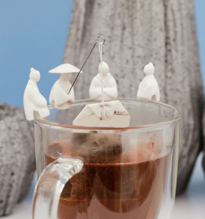 Image of Tea Holder Fisherman Set Of 4 from Kikkerland affiliated with SpookyMrsGreen.com mindful parenting and modern pagan lifestyle blog.