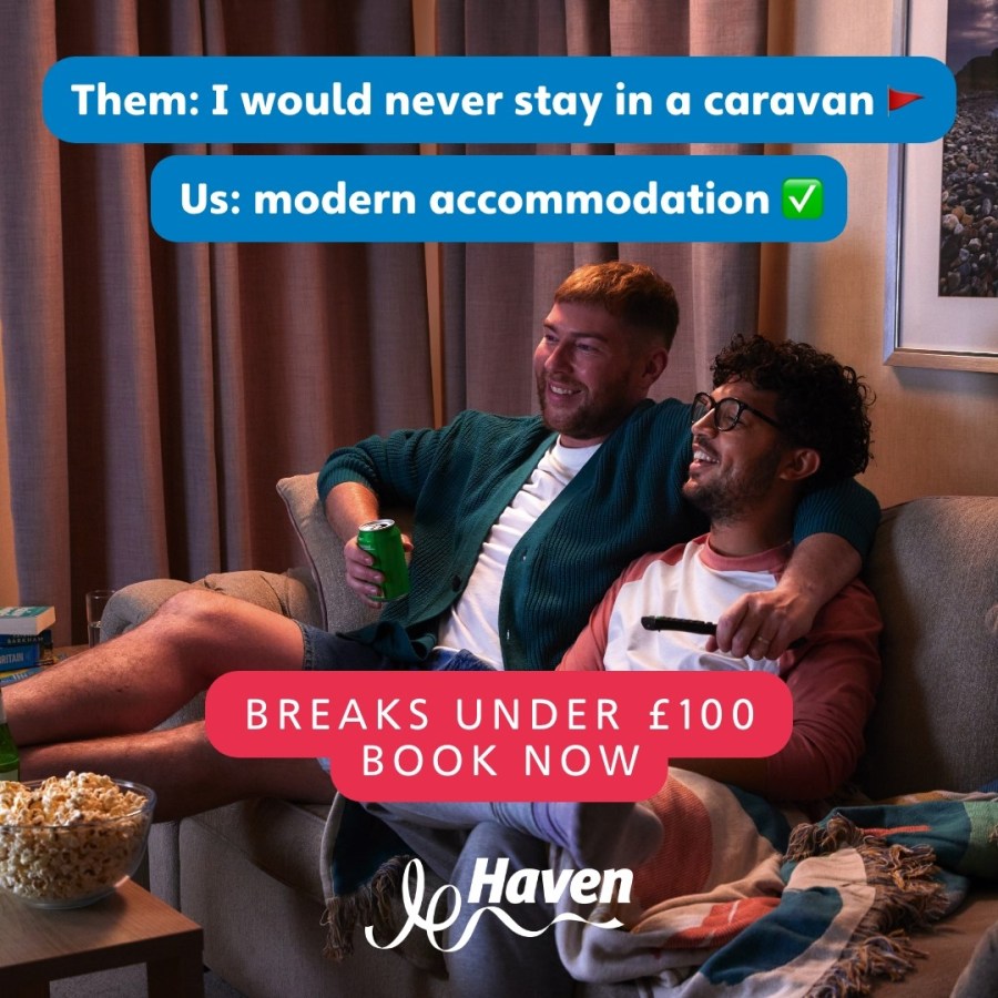 Image of a happy couple smiling and sitting on a sofa in a caravan. Text reads, "Them: I would never stay in a caravan. Us: Modern accommodation. Breaks under one hundred pounds. Book Now. Haven." Haven Holidays affiliated with SpookyMrsGreen.com mindful parenting and modern pagan lifestyle blog.