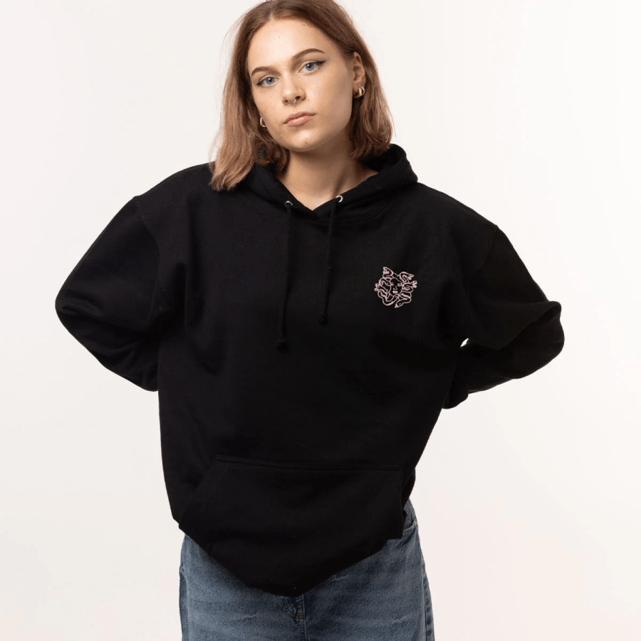 Image of a woman wearing a Medusa Embroidered Hoodie from The Spark Company affiliated with SpookyMrsGreen.com mindful parenting and modern pagan lifestyle blog.