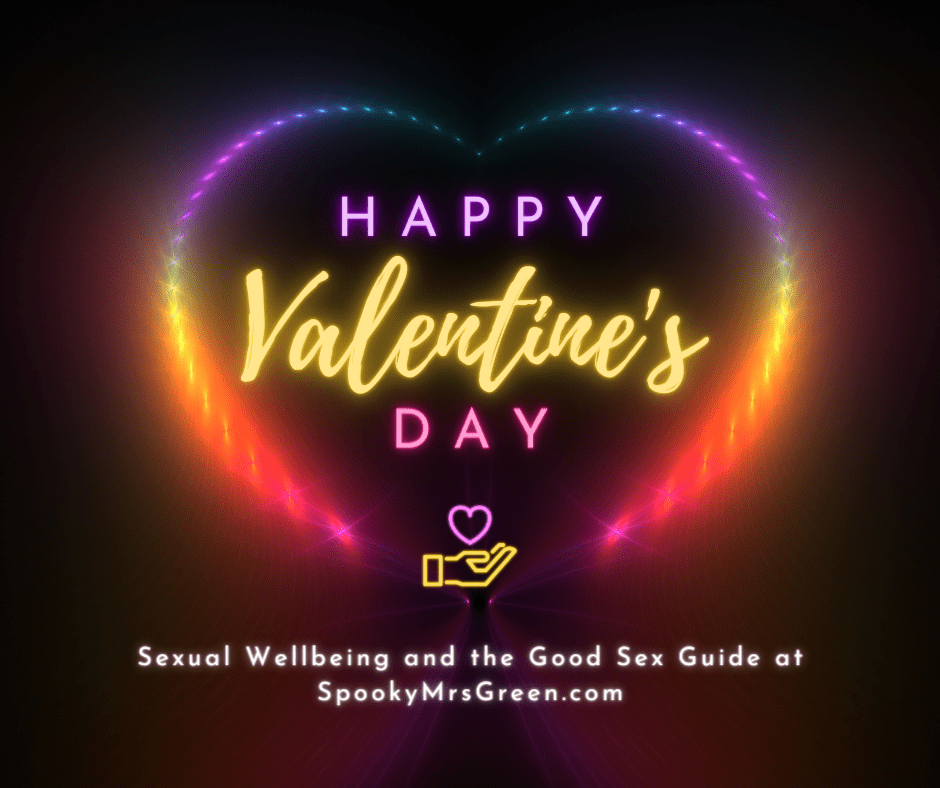 Colourful heart graphic on black background. Text reads, “Happy Valentine’s Day. Sexual Wellbeing and the Good Sex Guide for Valentine’s Day at SpookyMrsGreen.com.” Mindful parenting and modern pagan lifestyle blog.