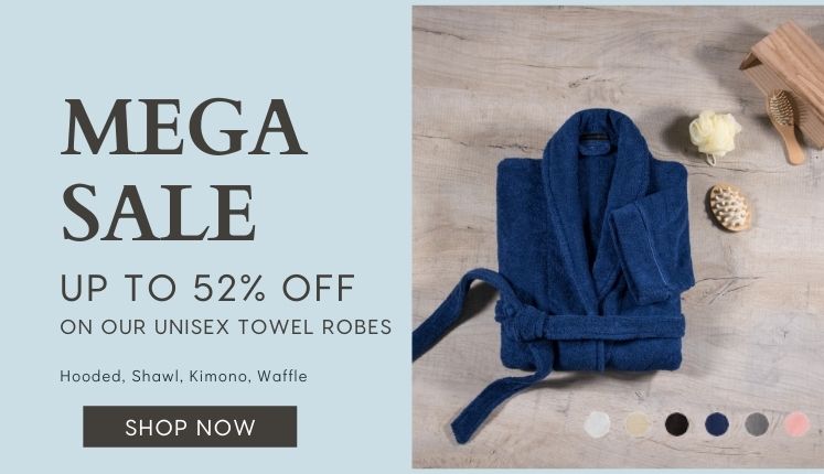 Image of a blue towelling bath robe. Text reads, “Mega sale up to fifty-two per cent off on our unisex towel robes. Hooded. Shawl. Kimono. Waffle. Shop now.” The Towel Shop affiliated with SpookyMrsGreen.com mindful parenting and modern pagan lifestyle blog.