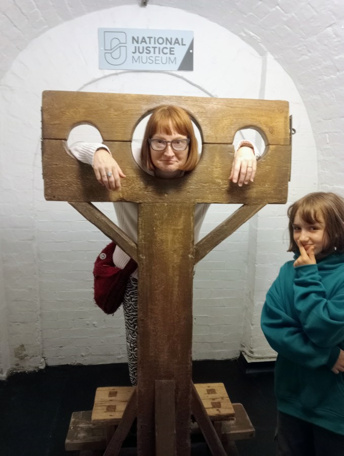 Image of SpookyMrsGreen in stocks at the National Justice Museum in Nottingham image credit Catherine Green at SpookyMrsGreen.com.