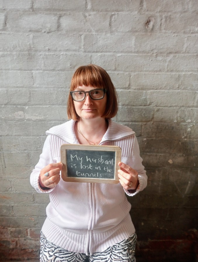 Image of LGBT fantasy book writer Catherine Green posing as a Victorian prisoner at the National Justice Museum in Nottingham image credit Catherine Green at SpookyMrsGreen.com.