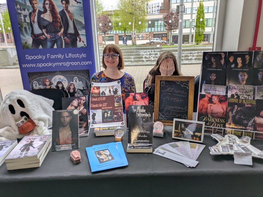 Coventry Book Extravaganza book signing alert featuring British paranormal author Catherine Green, vampire writer of urban fantasy books and werewolf fiction. Redcliffe Novels paranormal menage series set in Cornwall, England. Polyamory romantasy adventures, sapphic fiction and vampire hunter quests.