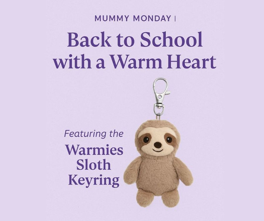 Cute cuddly image of Warmies Sloth keyring on a soft purple background. Text reads “Mummy Monday Back to School with a Warm Heart.” back to school routine tips UK for mindful families. UK pagan family pagan mom at SpookyMrsGreen.com spooky family lifestyle blog.