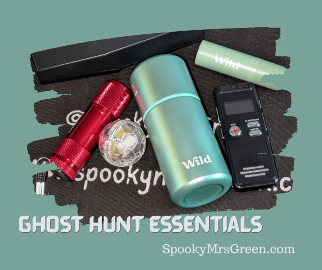 Image of Wild roll on deodorant, a red torch, a flashing cat ball, a digital voice recorder, Wild refillable lip balm and an EMF meter ghost hunt essentials at SpookyMrsGreen.com.